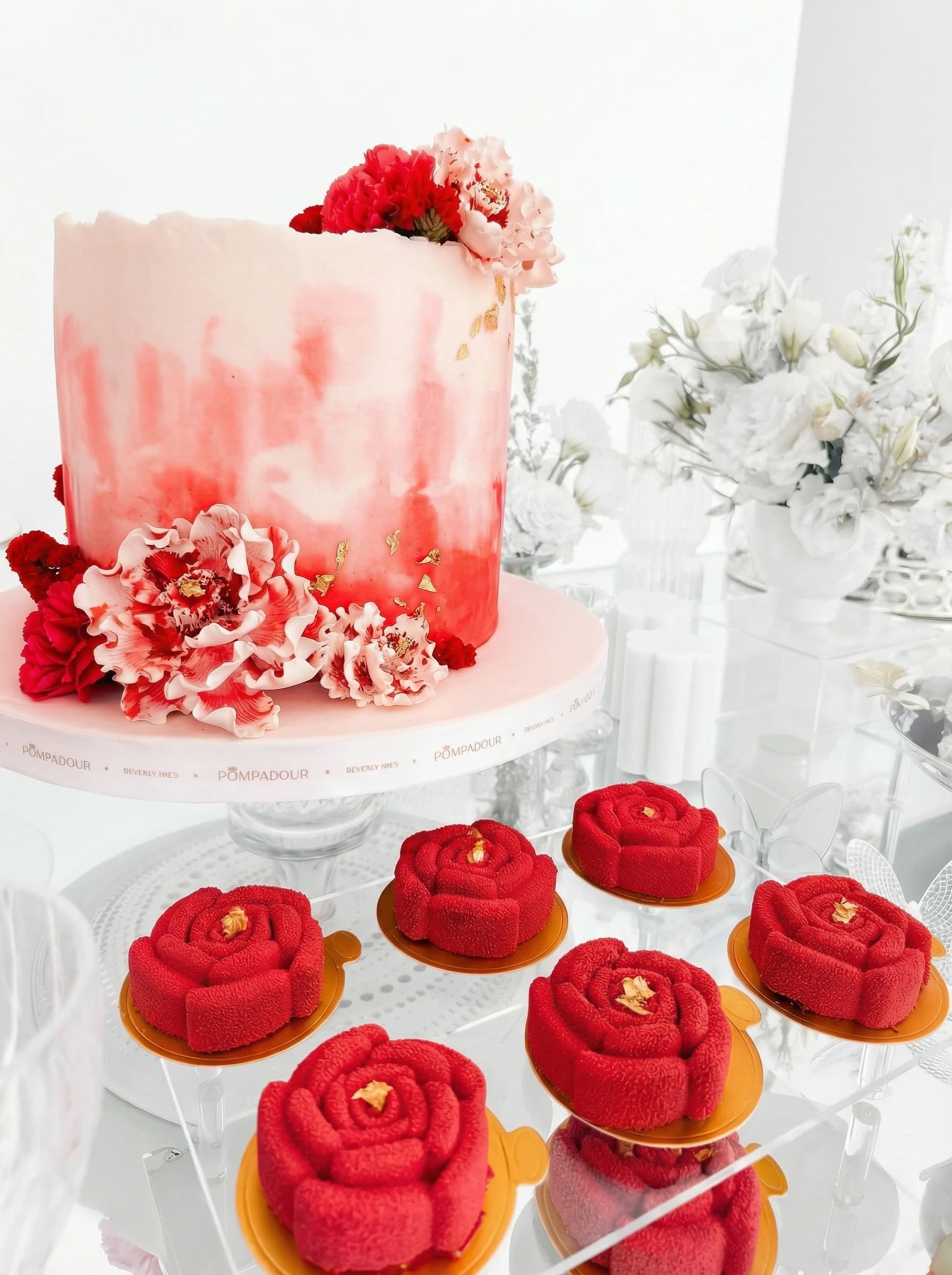 Elegant French pastry catering display featuring macarons, croissants, and cakes for Beverly Hills events