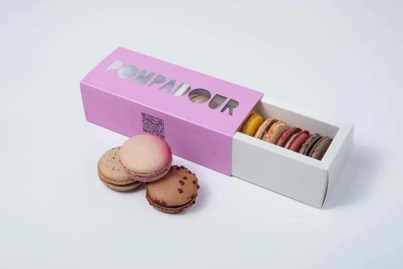Assorted Macarons (Dozen) — Chef's selection of 12 handcrafted French macarons. Flavors may include: pistachio, raspberry, chocolate, vanilla, coffee, lemon, birthday cake, blueberry lavender, rose, red velvet