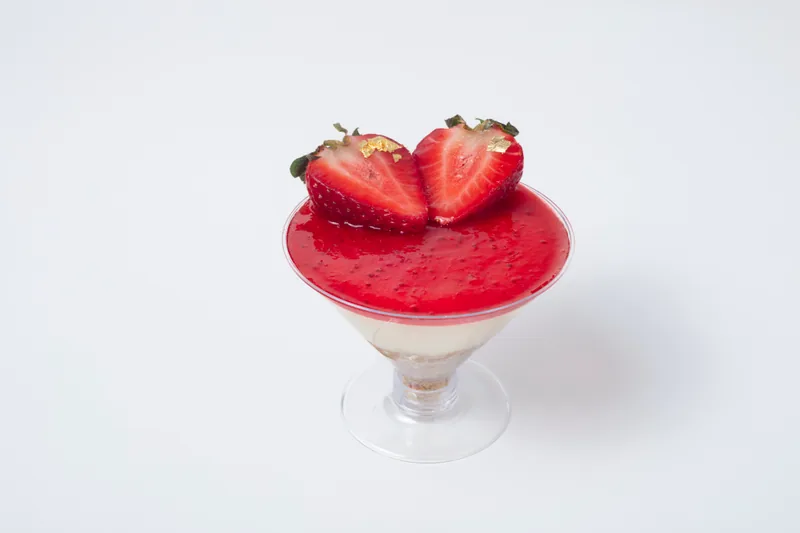 French Strawberry Cheesecake — Light, mousse-style French cheesecake crowned with glazed fresh strawberries. Lighter and more refined than traditional cheesecake