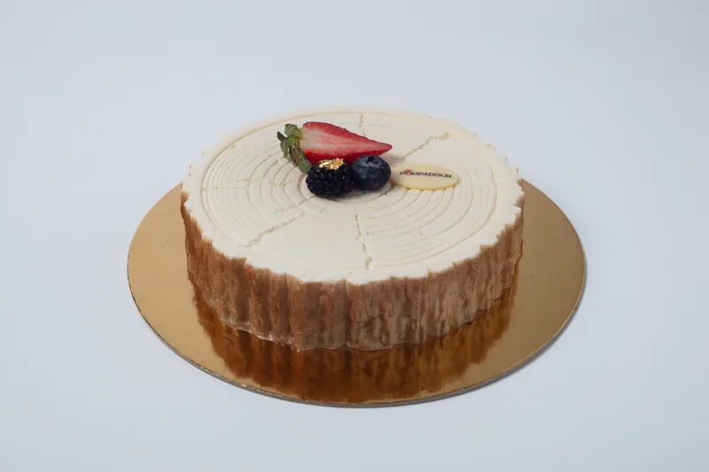 Foresta Mixed-Berry Gâteau — Delicate vanilla génoise layered with silky vanilla crème and a medley of fresh seasonal berries. A signature French-inspired celebration cake